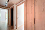 Step into this beautifully designed hallway, showcasing a seamless blend of modern and natural elements.
