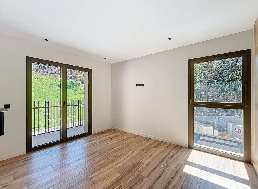 Discover this stunning property featuring a bright and airy interior with beautiful wooden floors.