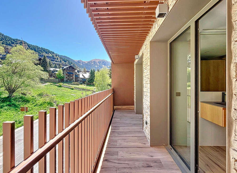 Enjoy breathtaking mountain views from this stunning balcony.