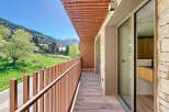 Enjoy breathtaking mountain views from this stunning balcony.