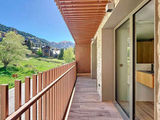 Enjoy breathtaking mountain views from this stunning balcony.