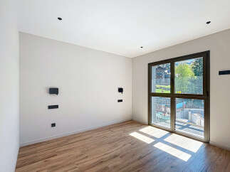 Discover this stunning property featuring a bright and airy interior with beautiful wooden floors.