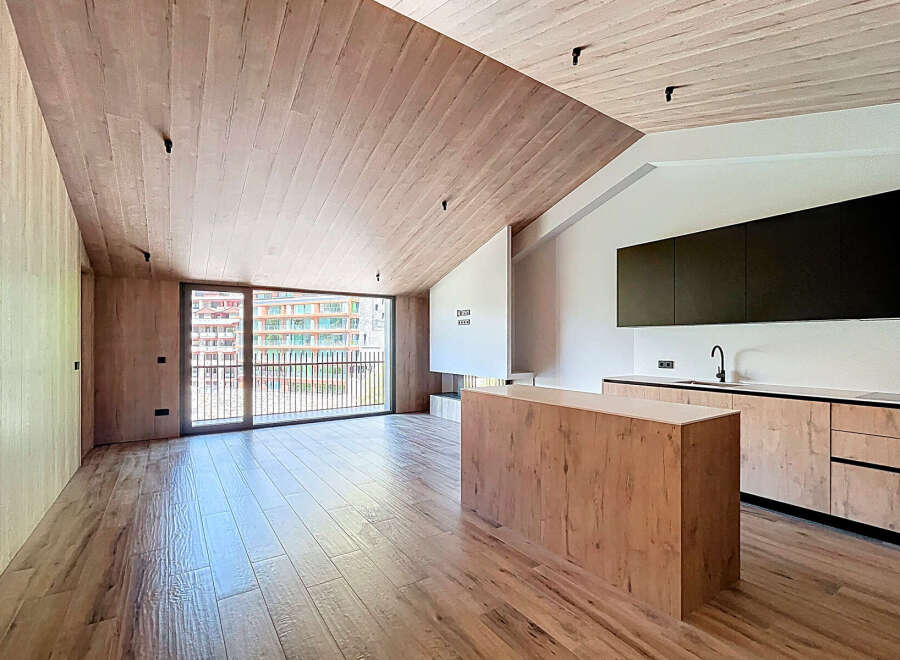Experience modern luxury in this stunning property featuring a unique wooden ceiling and flooring that exudes warmth and sophistication.