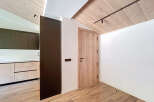 This stunning property boasts a modern interior design with a focus on natural materials.