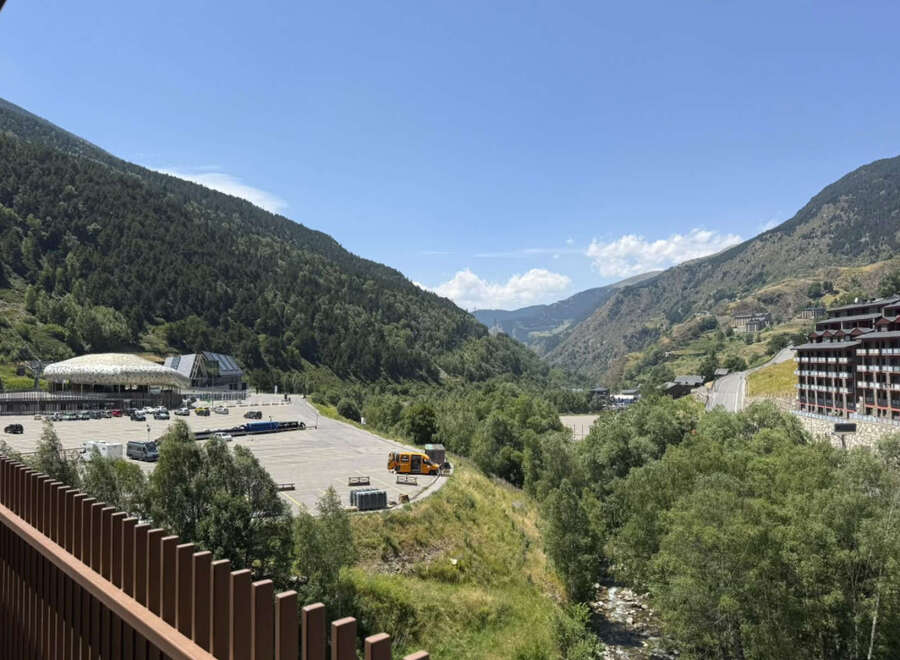 Experience the breathtaking mountain views from this property, nestled in a serene valley.