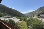 Experience the breathtaking mountain views from this property, nestled in a serene valley.