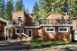This charming property features a unique architectural design with a warm, inviting facade.