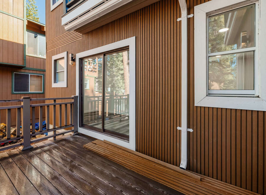 This stunning property boasts a beautiful wooden deck, perfect for enjoying the outdoors.