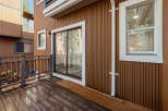 This stunning property boasts a beautiful wooden deck, perfect for enjoying the outdoors.