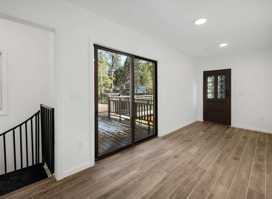 This stunning property boasts a bright and airy interior with beautiful wood-look flooring.