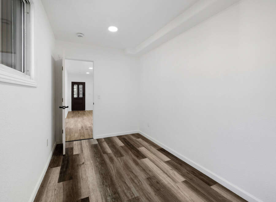 Step into this inviting space, featuring a modern design and neutral color palette.