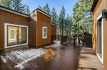This stunning property boasts a beautiful wooden deck, perfect for enjoying the serene surroundings.
