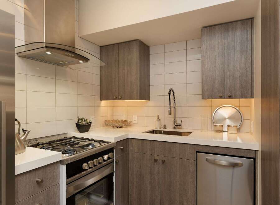 This modern kitchen boasts sleek design and functionality.