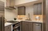 This modern kitchen boasts sleek design and functionality.