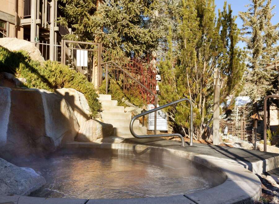 Enjoy the ultimate relaxation experience in this stunning outdoor hot tub.