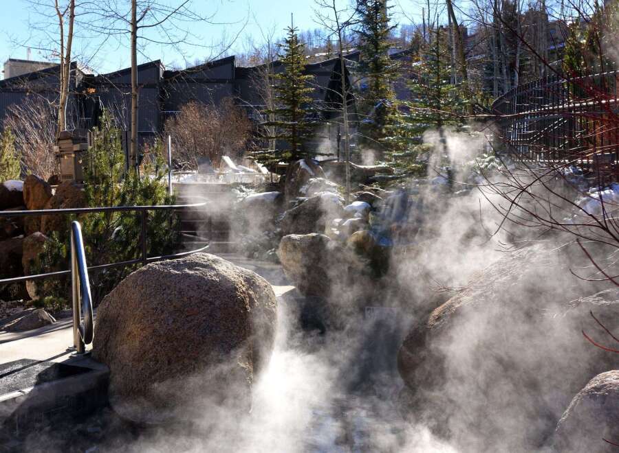 Experience ultimate relaxation in this stunning outdoor spa setting.