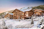 Experience luxury living in this stunning chalet-style property nestled in a picturesque winter wonderland.