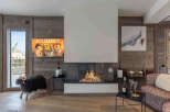 Experience luxury living in this stunning property featuring a cozy fireplace, perfect for chilly evenings.