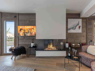 Experience luxury living in this stunning property featuring a cozy fireplace, perfect for chilly evenings.