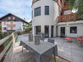 Discover the charm of this stunning property, featuring a modern design and a serene outdoor space.