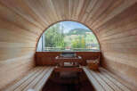 Experience ultimate relaxation in this stunning sauna with breathtaking views.
