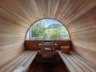 Experience ultimate relaxation in this stunning sauna with breathtaking views.
