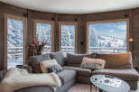 This cozy living room features a comfortable sectional sofa, perfect for relaxing.
