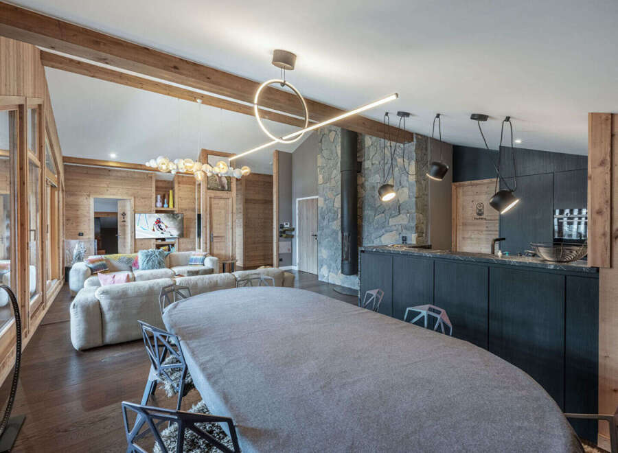 Experience luxury living in this stunning chalet, featuring a spacious open-plan design perfect for entertaining.
