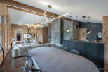 Experience luxury living in this stunning chalet, featuring a spacious open-plan design perfect for entertaining.