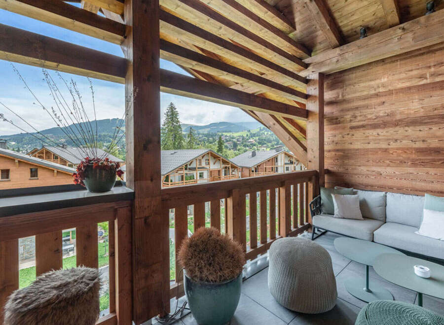 Enjoy breathtaking mountain views from this stunning balcony.