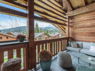 Enjoy breathtaking mountain views from this stunning balcony.