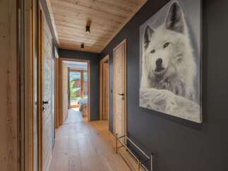 Step into this inviting hallway, showcasing a blend of rustic charm and modern design.