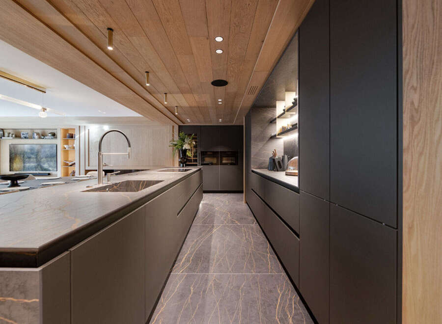 Experience luxury living in this stunning modern kitchen.