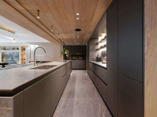 Experience luxury living in this stunning modern kitchen.