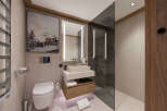 Experience luxury living in this stunning bathroom, featuring a modern design and high-end finishes.