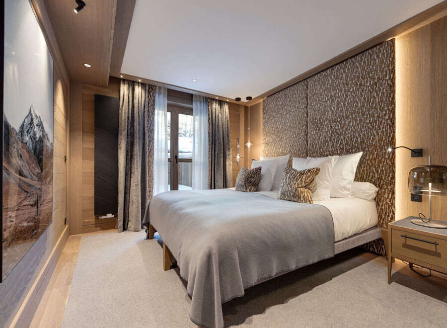 Experience luxury and comfort in this stunning bedroom.