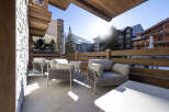 Enjoy breathtaking mountain views from this luxurious balcony.