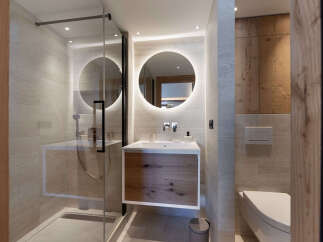 Step into modern luxury with this stunning bathroom design.