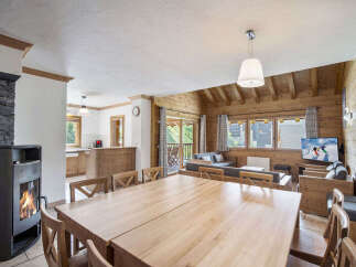 Experience the warmth and charm of this stunning chalet, perfect for a cozy getaway.