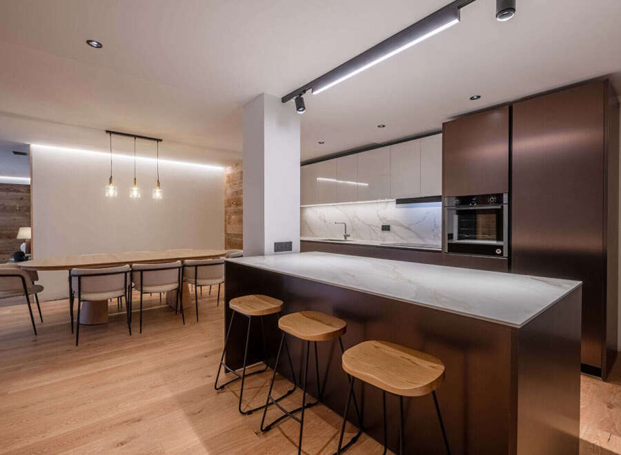 This stunning modern kitchen boasts sleek design and high-end finishes.