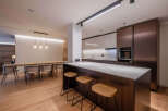 This stunning modern kitchen boasts sleek design and high-end finishes.