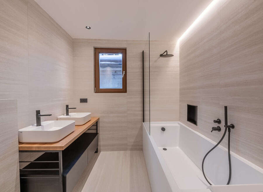 This modern bathroom features a sleek design with a minimalist aesthetic.