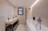 This modern bathroom features a sleek design with a minimalist aesthetic.