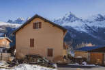 Nestled in a picturesque mountain village, this charming property offers stunning views of the snow-capped peaks.