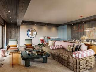 Experience luxury living in this stunning property, featuring a beautifully designed living space with a modern aesthetic.