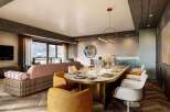 Experience luxury living in this stunning property, featuring a spacious dining area perfect for entertaining.
