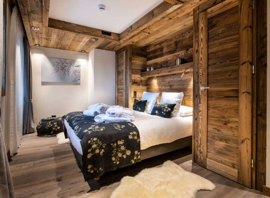 Experience rustic elegance in this stunning bedroom.