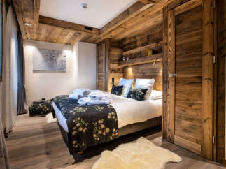 Experience rustic elegance in this stunning bedroom.
