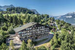 Discover a stunning property nestled in a picturesque mountain setting.