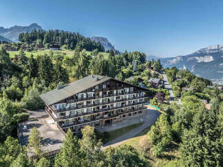 Discover a stunning property nestled in a picturesque mountain setting.